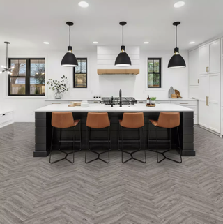 Grey-brown wood effect LVT flooring in a contemporary kitchen