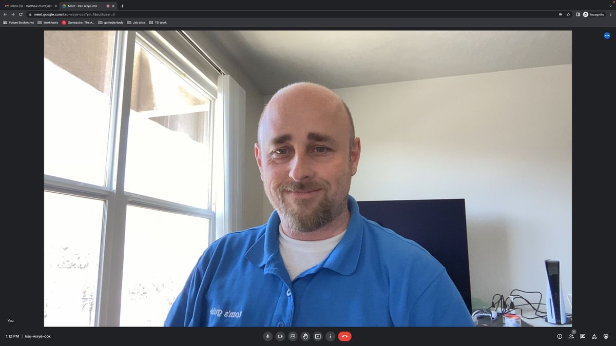 Apple Studio Display camera in Google Meet, blinds open
