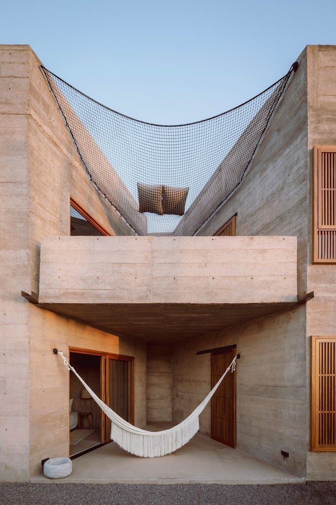A brutalist building turned luxury hotel.