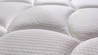 DreamCloud Premier Hybrid Mattress review image shows the top of the breathable cover