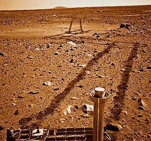 Tracks in the Martian soil made by the Spirit rover.