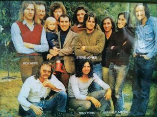 Peter (holding his daughter) with folk rock band Heron, whom he worked with