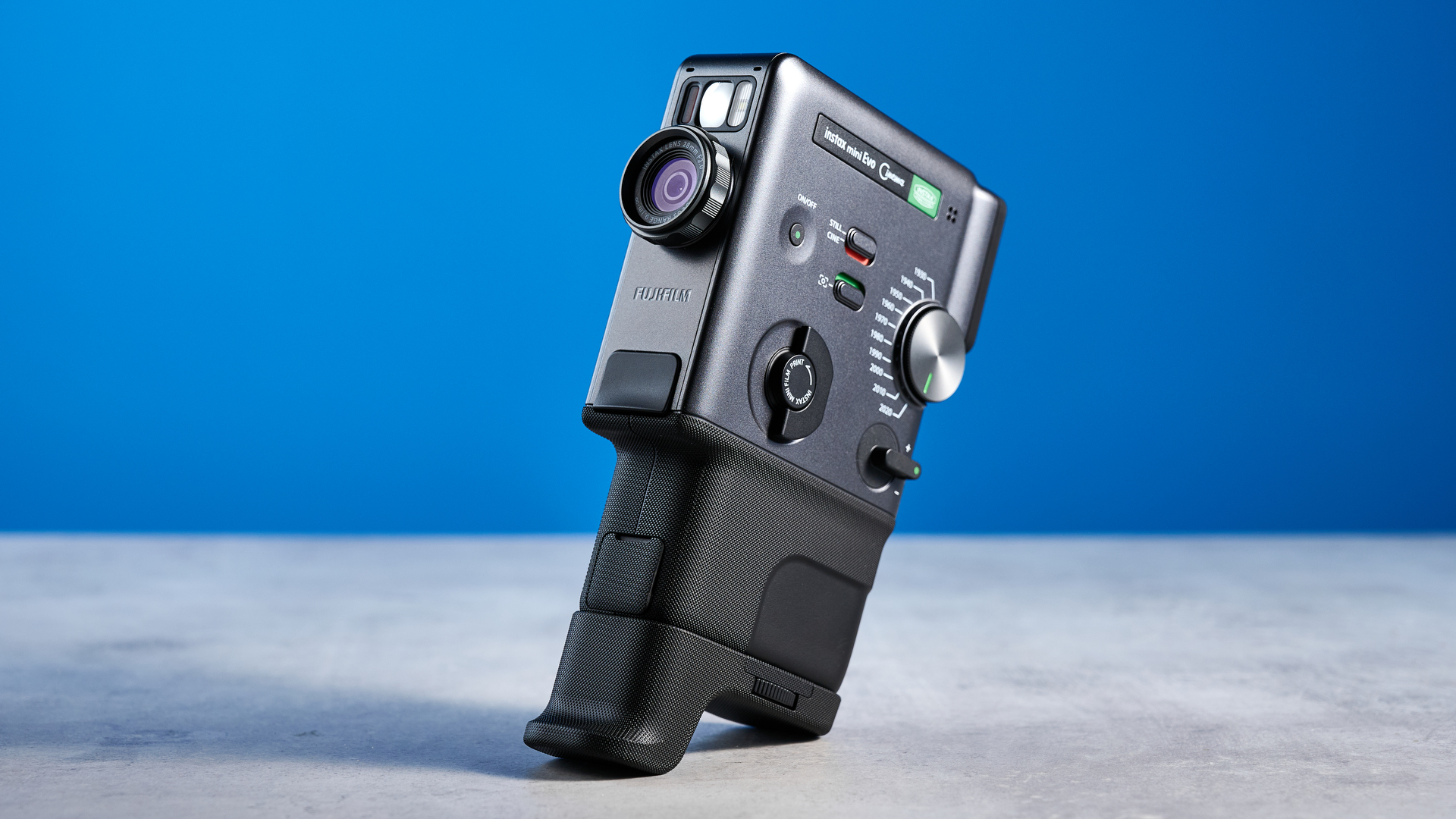 A Fujifilm Instax mini Evo Cinema hybrid instant camera