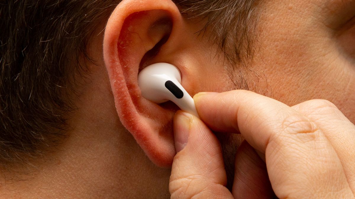 AirPods Pro in man&#039;s ear