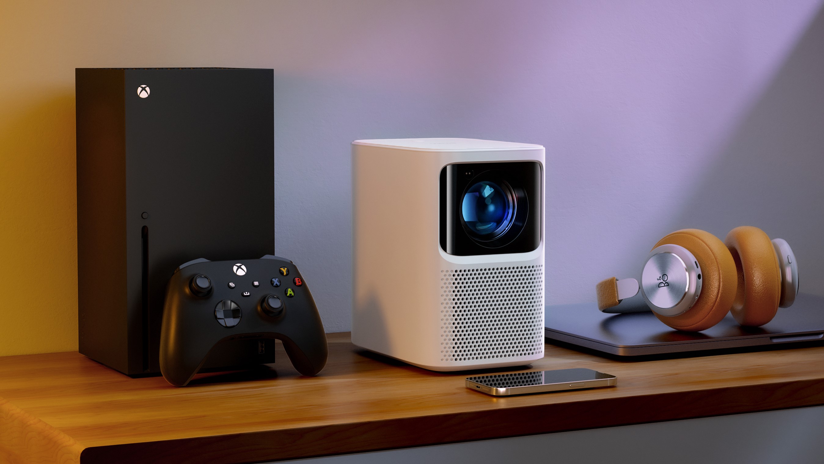 The Emotn N1 next to an Xbox Series X which is bigger than it