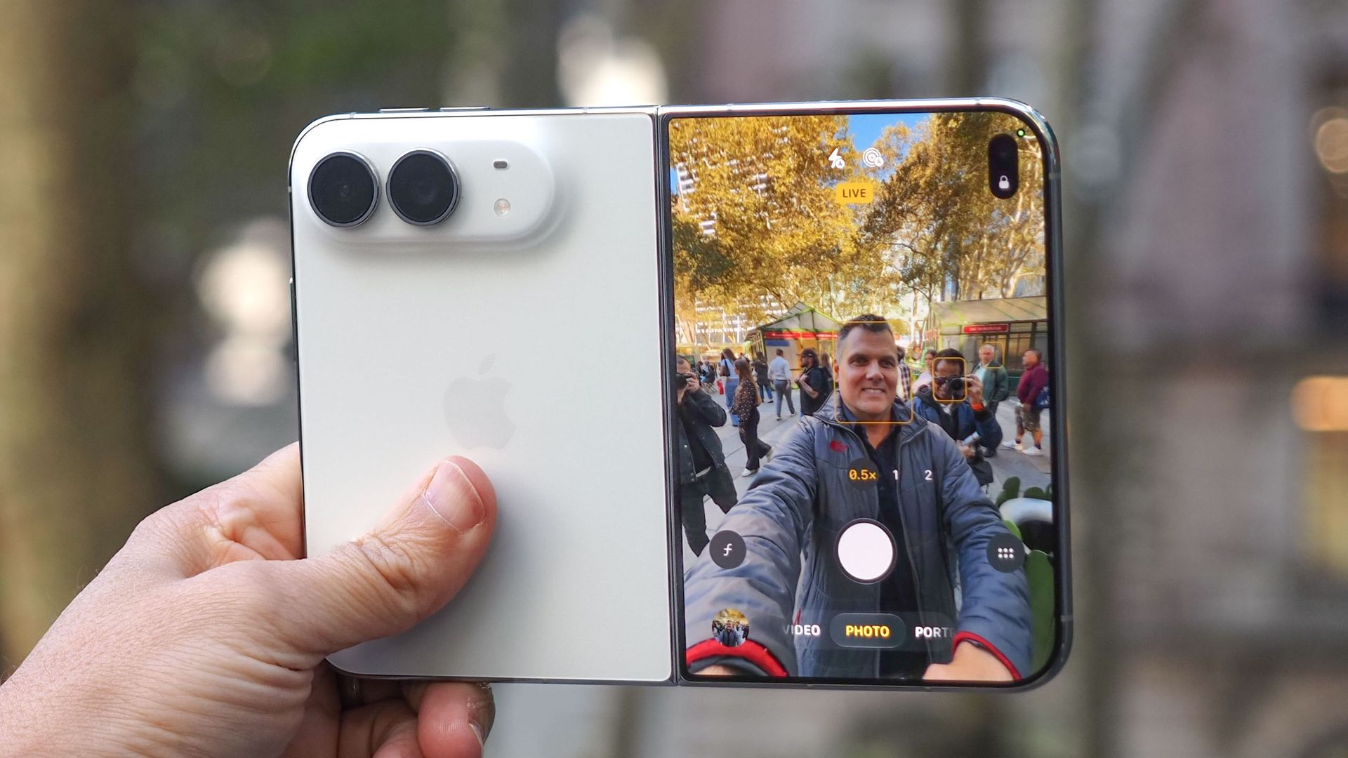 iPhone Duo shown held in hand