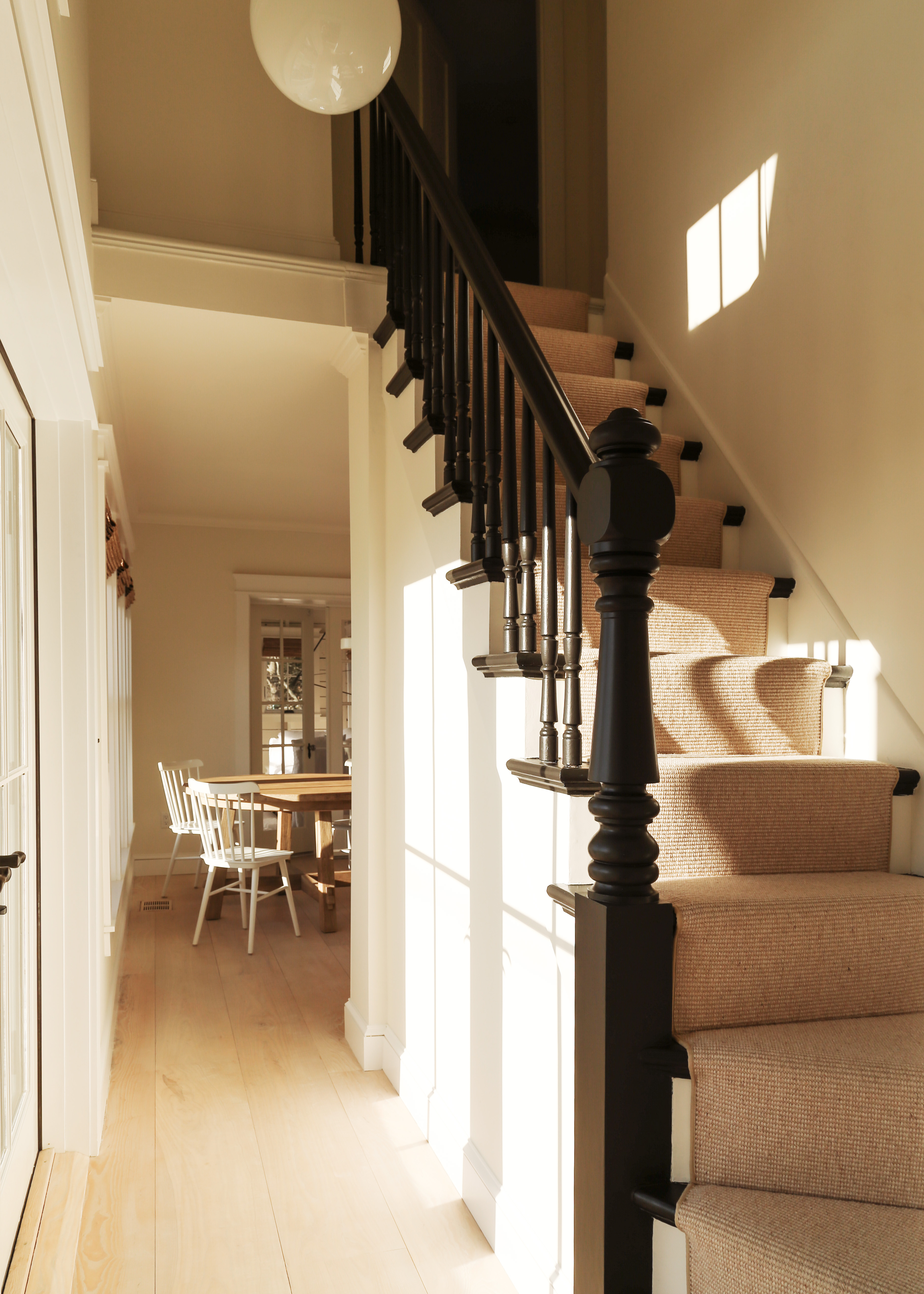 Hallway with view through to dining room