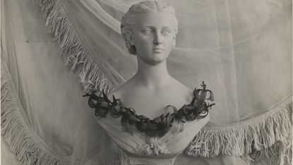 Bust with a necklace of lilies by Constance Spry, c.1935 (RHS Lindley Collections)