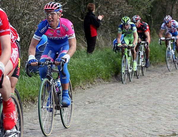 Marco Bandiera (Lampre) seems to cry in pain.