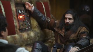 Kayvan Novak excitedly prepares to pull a lever in his coffin in What We Do in the Shadows S6 E11 - "The Finale."