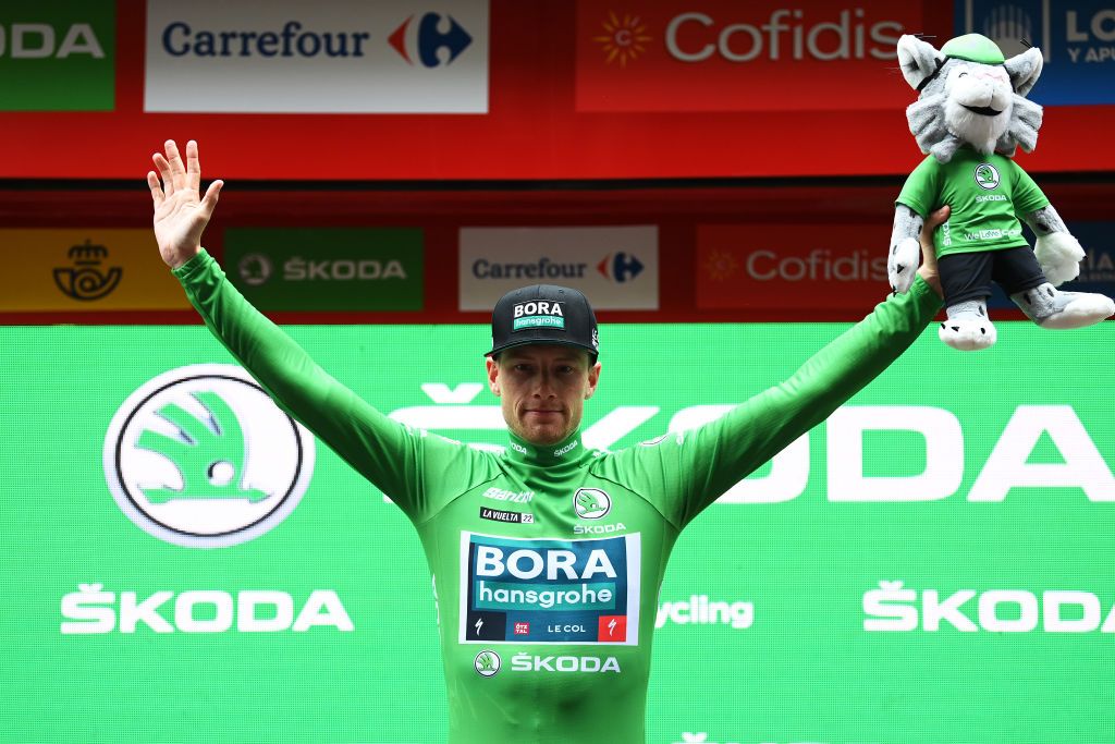 BILBAO SPAIN AUGUST 24 Sam Bennett of Ireland and Team Bora Hansgrohe celebrates winning the Green Points Jersey on the podium ceremony after the 77th Tour of Spain 2022 Stage 5 a 1872km stage from Irn to Bilbao LaVuelta22 WorldTour on August 24 2022 in Bilbao Spain Photo by Justin SetterfieldGetty Images