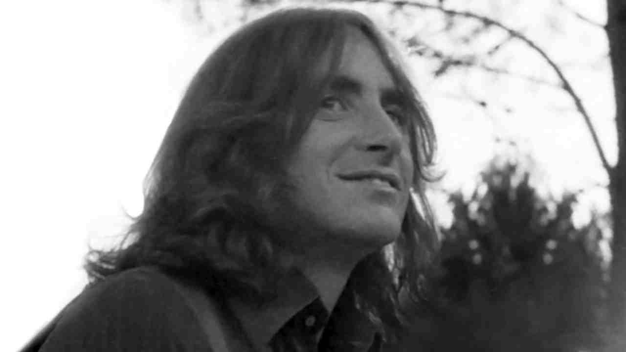 Bon Scott posing for a photograph in 1974