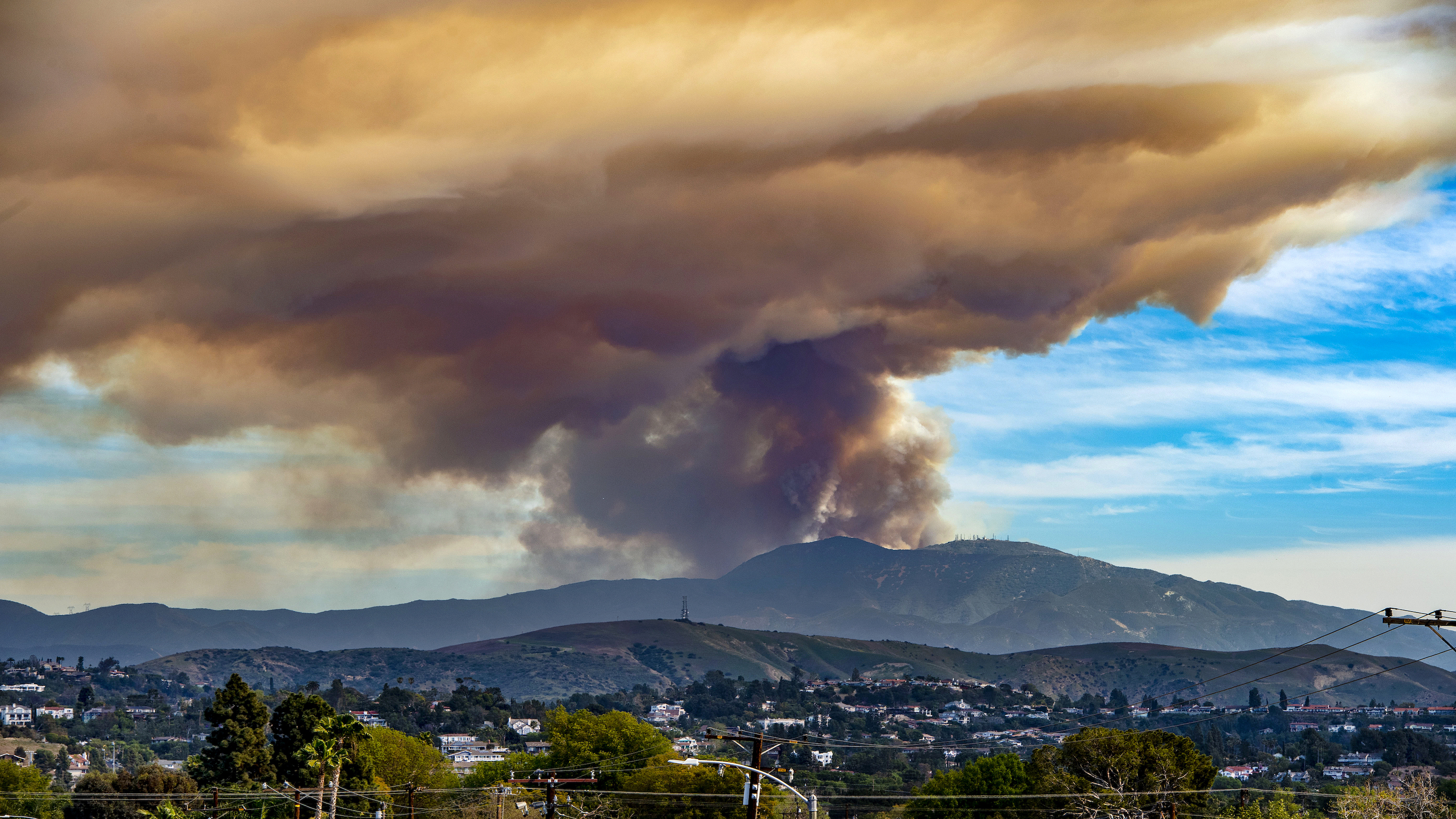 A 400-acre wildfire burns in the Cleveland National Forest in this view from Orange on Wednesday, March 2, 2022.