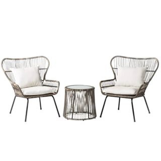 A three-piece wicker outdoor patio set with two seats and a table