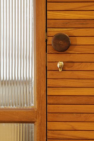 Wooden door with side silver strips