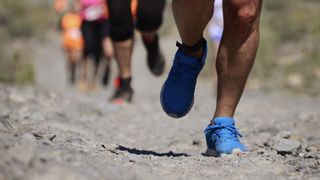 the feet of runners