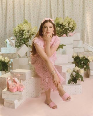 Nellie Diamond wearing pink shoes and accessories from the new collection