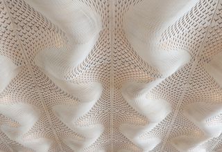 top, the wave-shaped wooden boardroom ceiling of Orange HQ in Paris