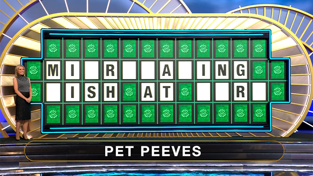 Vanna White stands next to a partially solved Pet Peeves puzzle.