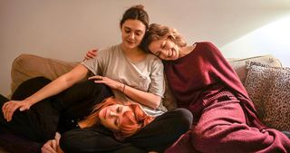 (L-R) Natasha Lyonne as Rachel, Elizabeth Olsen as Christina and Carrie Coon as Katie in "His Three Daughters" streaming on Netflix in September 2024