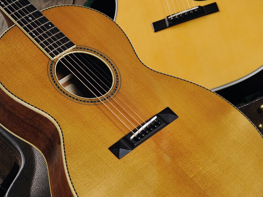 The guitar exudes a vintage, pre-war feel.