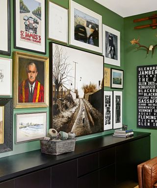 study with dark green walls and artwork gallery wall designed by Sarah McPhee in Melbourne period house