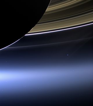 NASA’s Cassini spacecraft snapped this view of Saturn's rings, with Earth way, way off in the distance, using a wide-angle lens on July 19, 2013. You’re looking at the dark side of Saturn, its bright limb, the main rings, plus the F, G and E rings.