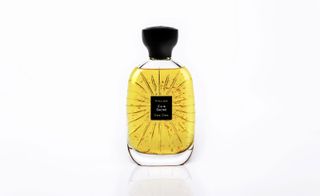 Bottle of gold fragrance from Atlier