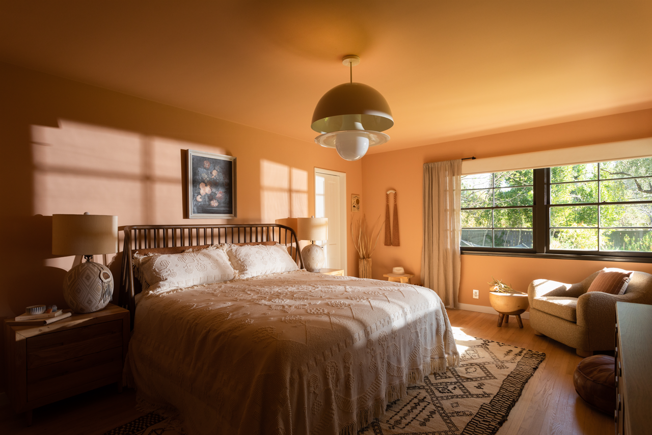 A bedroom drenched in yellow light