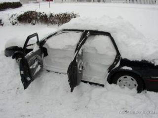 Car filled with snow