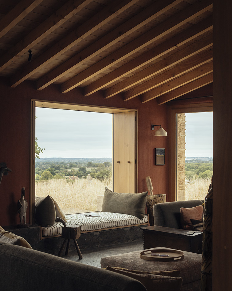 view of Rammed Earth House by Tuckey Design Studio with tactile walls and earth tones