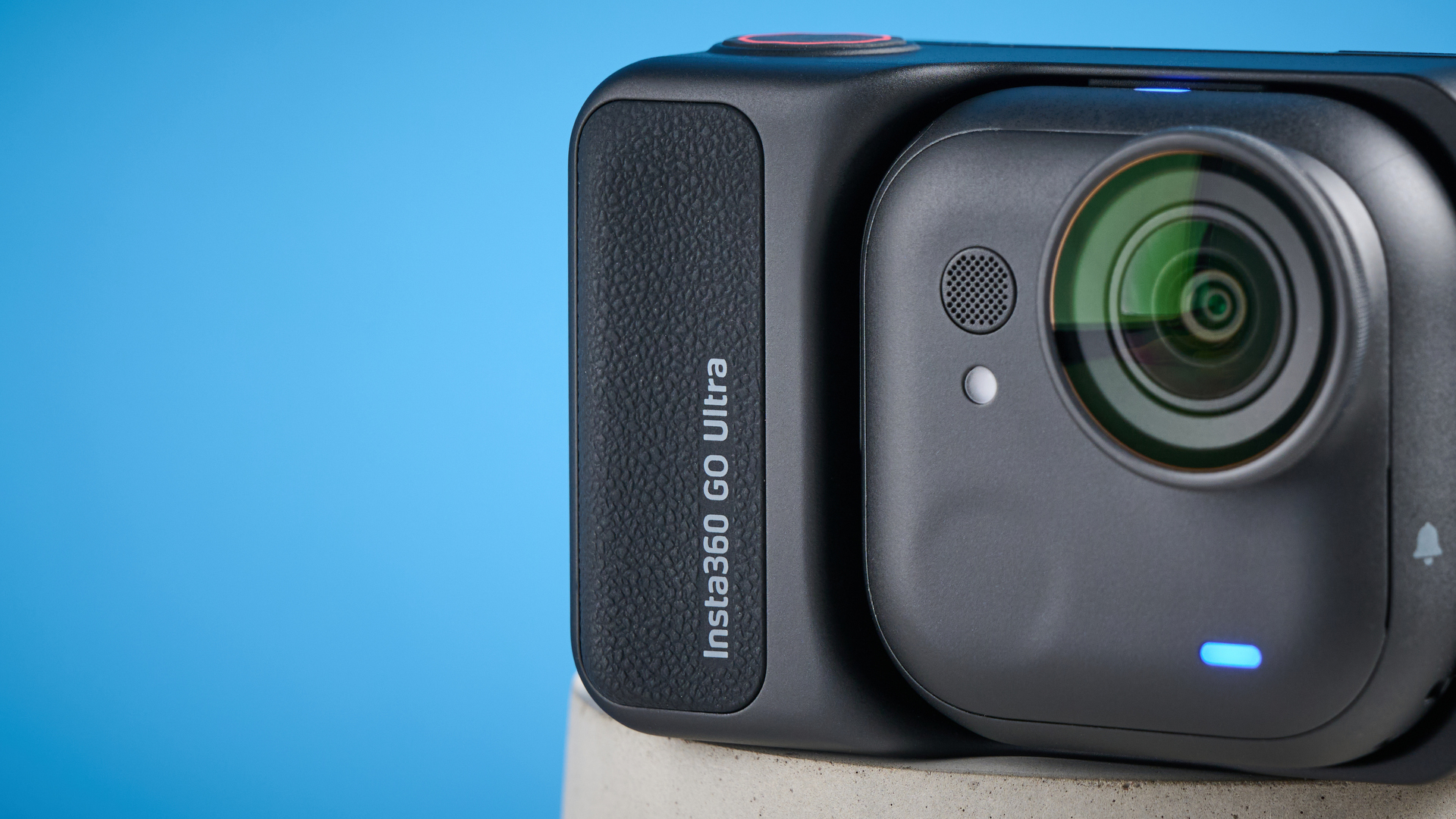 Insta360 Go Ultra against a blue background