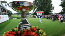 Viktor Hovland hits a shot in front of the FedEx Cup