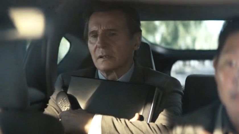 Frank holding his TiVo in the cab in The Naked Gun