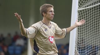 GILLINGHAM, - 7 SEPTEMBER : Gary O'Neil of Portsmouth celebrates number three during the Nationwide Division One match between Gillingham v Portsmouth at the Priestfield Stadium, Gillingham on the 7 September, 2002. (Photo by Jamie McDonald/Getty Images)