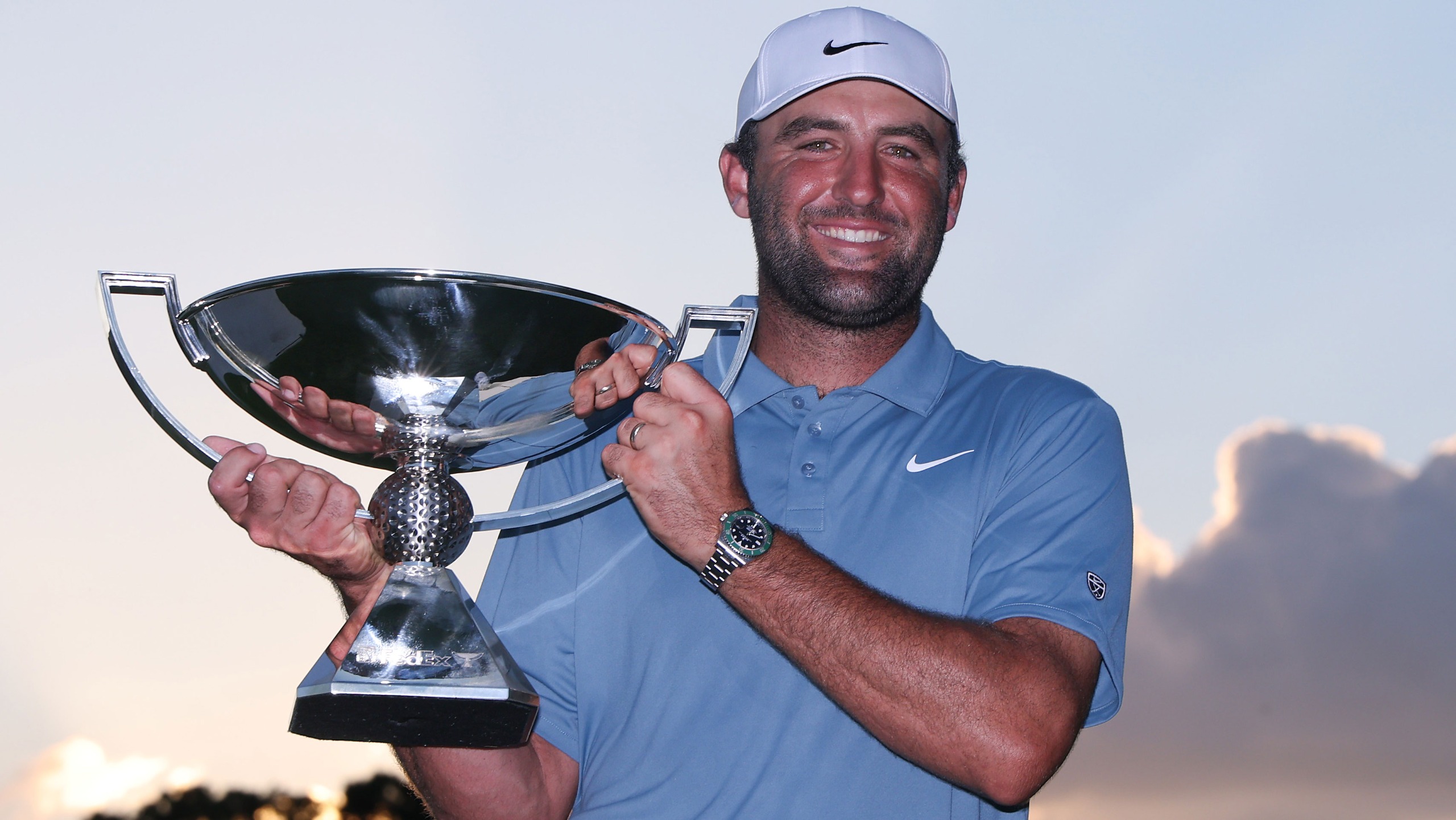 Scottie Scheffler poses with the trophy after winning the final round of the Tour Championship 2026 