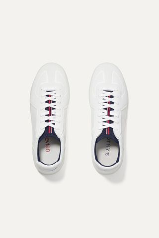 white sneakers with blue, red, and pink stripes