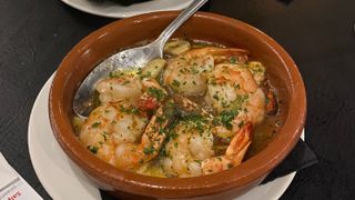 Gambas al pil-pil (prawns with a garlic and chilli oil-based sauce)