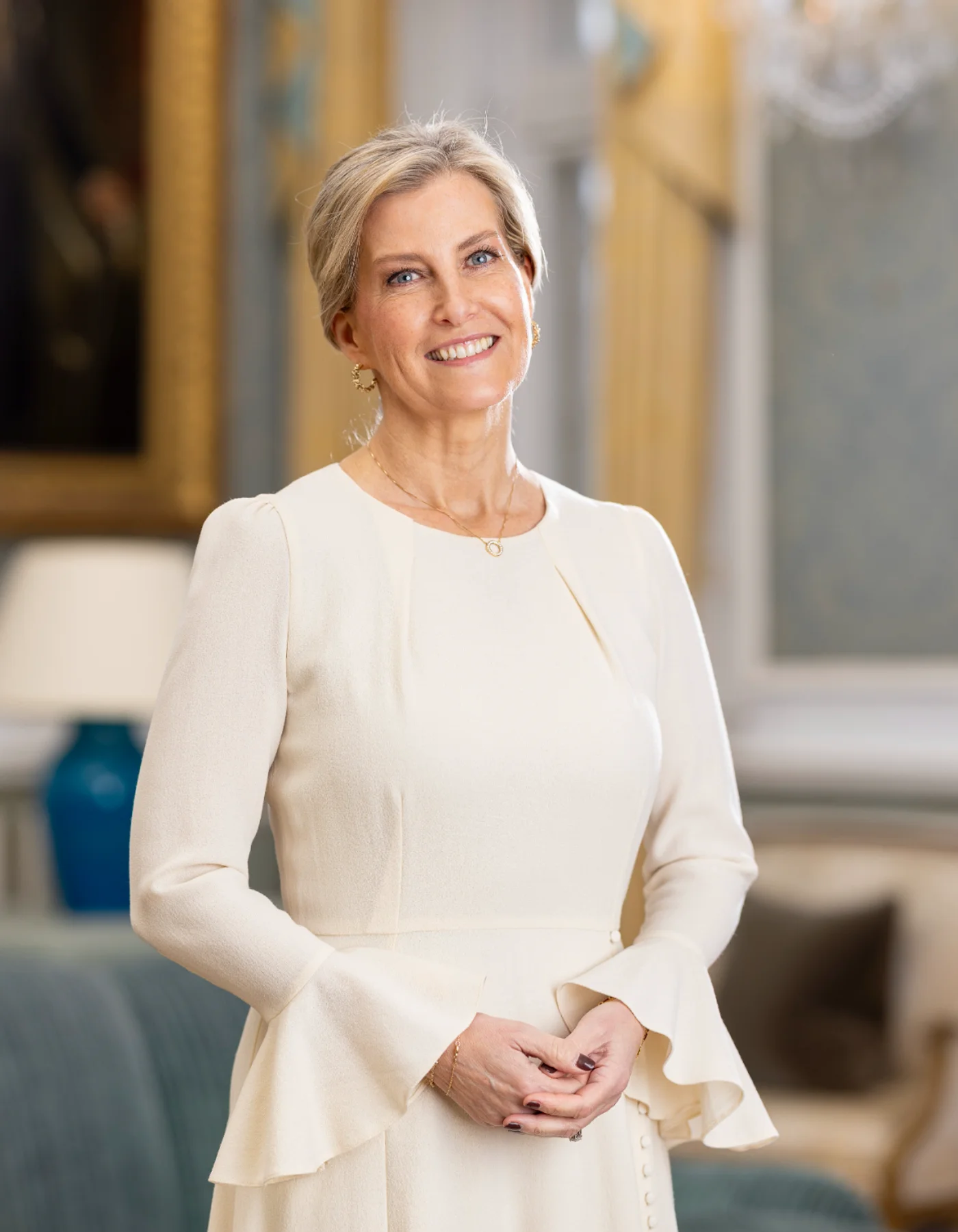 Duchess sophie wearing an ivory dress and smiling