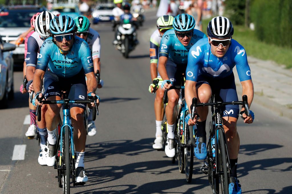 PRZEMYSL POLAND AUGUST 10 LR Manuele Boaro of Italy and Team Astana Premier Tech Gabriel Cullaigh of The United Kingdom and Movistar Teamin the Breakaway during the 78th Tour de Pologne 2021 Stage 2 a 201km stage from Zamo to Przemyl 341m TourdePologne TDP2021 UCIWT on August 10 2021 in Przemysl Poland Photo by Bas CzerwinskiGetty Images