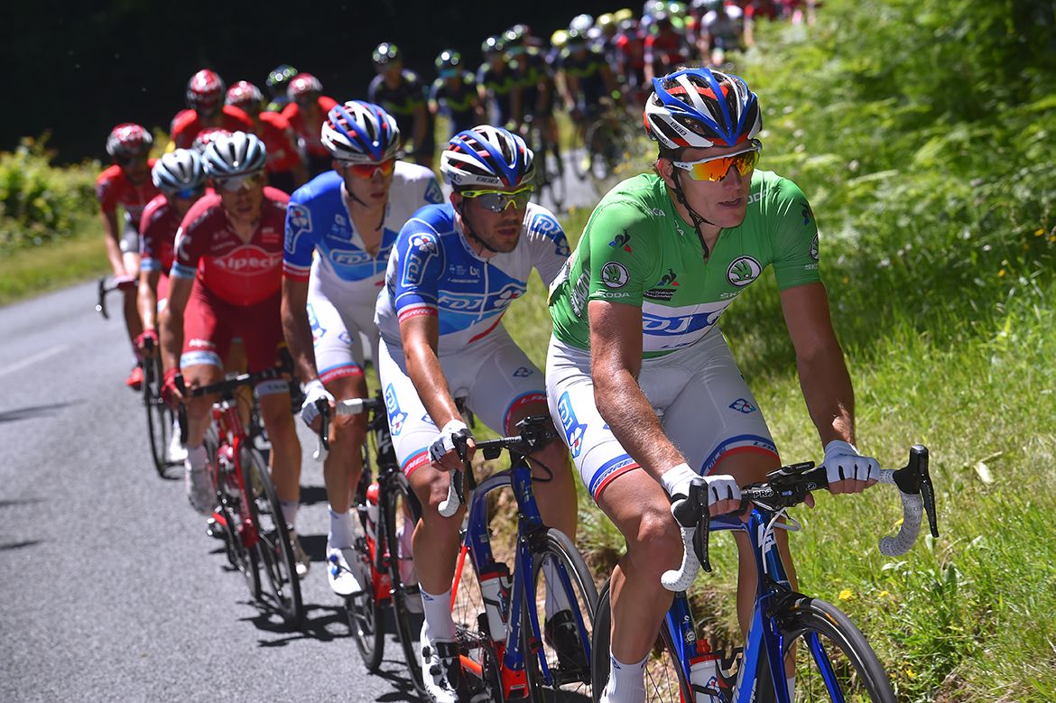 Arnaud Demare wears the green points jersey