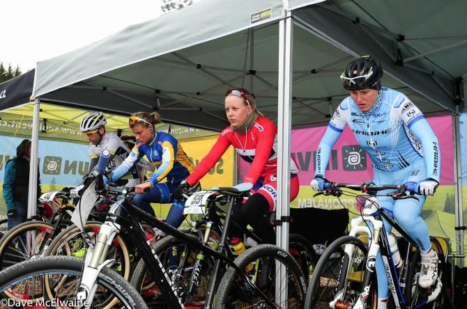 Jenny Rissveds (Sweden) warming up before her qualifying round (second from left)
