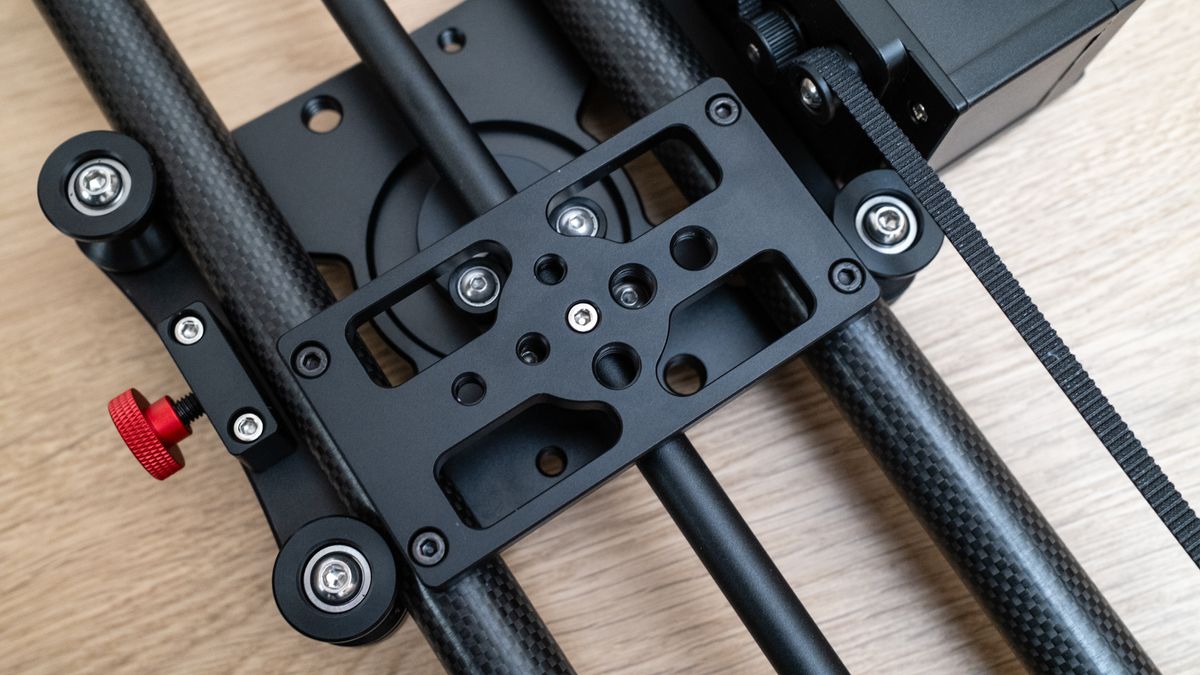 Neewer ER1 Motorized Carbon Fiber Camera Slider on a wooden surface