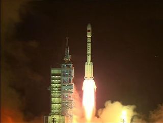 China's first space laboratory module, Tiangong 1 (Chinese for "Heavenly Palace") blasts off from the Jiuquan Satellite Launch Center on Sept. 29, 2011. The module will fly a 2-year mission for docking tests.