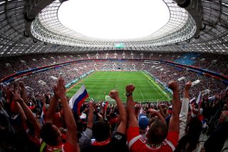 Fans celebrate the opening goal scored by Iury Gazinsky of Russia during the 2018 FIFA World Cup Russia Group A match between Russia and Saudi Arabia