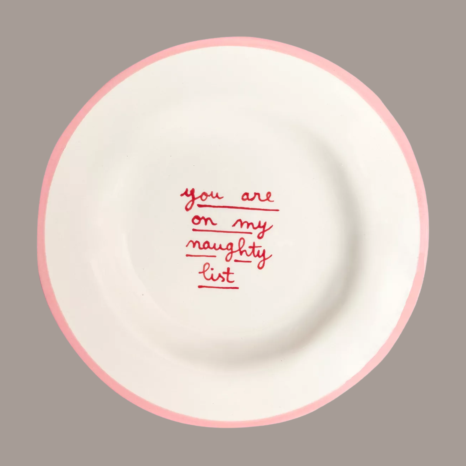 A plate with red writing in the middle