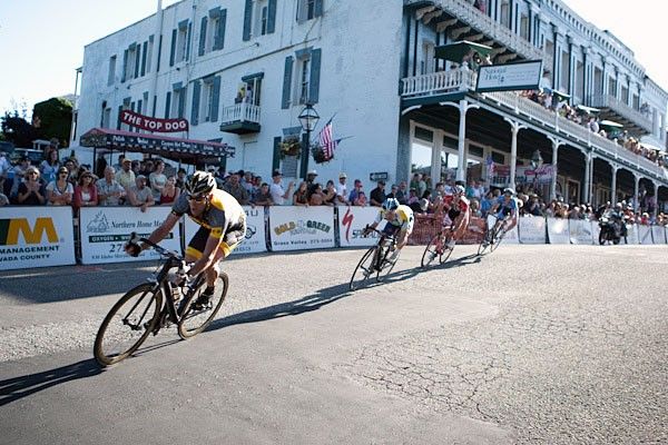 Lance Armstrong flies downhill ahead of Levi Leipheimer.