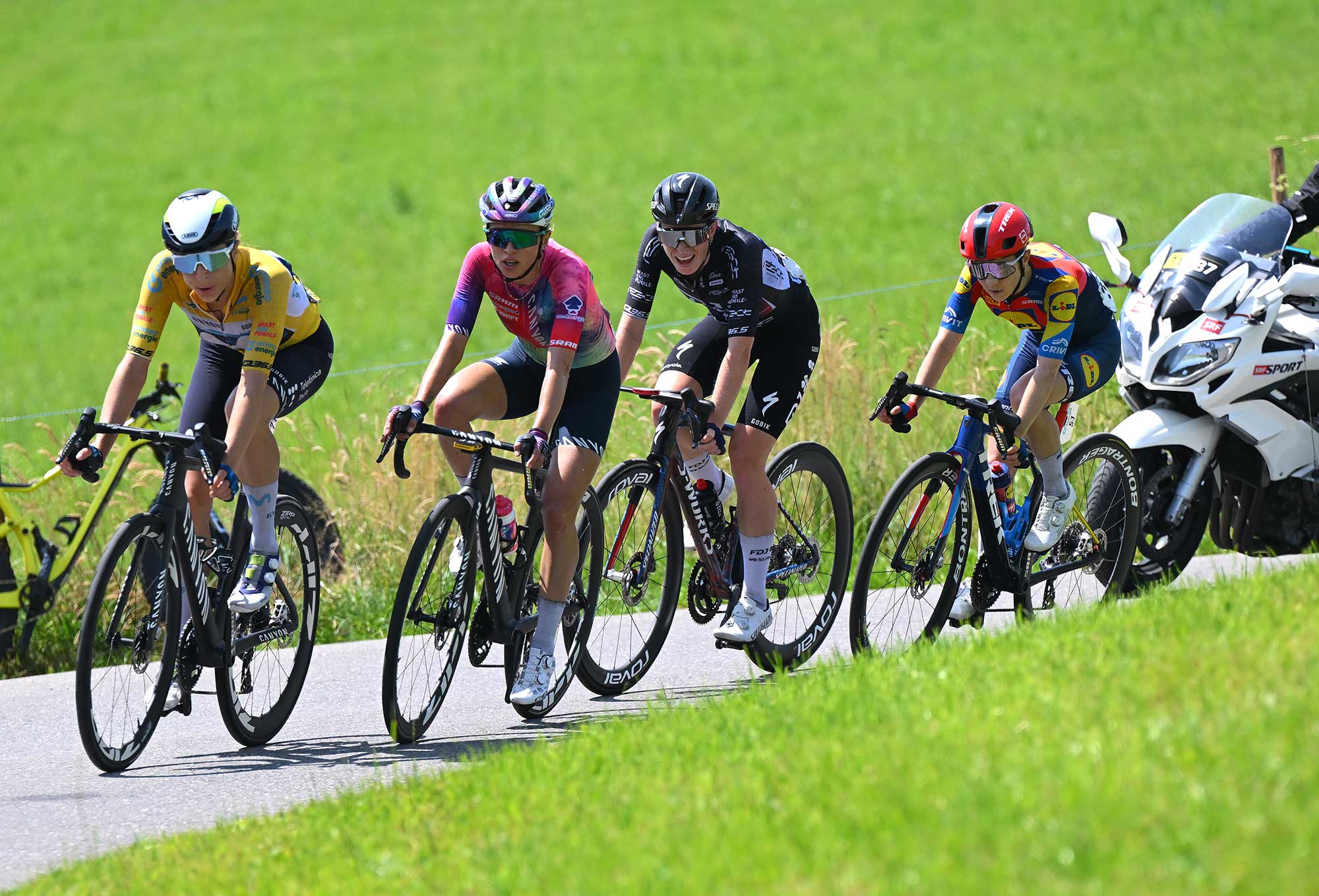 KUSNACHT, SWITZERLAND - JUNE 15: (L-R) Marlen Reusser of Switzerland and Team Movistar - Yellow Leader Jerse, Katarzyna Niewiadoma of Poland and Team CANYON/SRAM zondacrypto, Demi Vollering of Netherlands and Team FDJ - SUEZ - Black Points Jersey and Niamh Fisher-Black of New Zealand and Team Lidl - Trek compete in the breakaway climbing to the Michaelskreuzstrasse (774m) during the 5th Tour de Suisse Women 2025, Stage 4 a 129.4km at stage from Kusnacht to Kusnacht / #UCIWWT / on June 15, 2025 in Kusnacht, Switzerland.