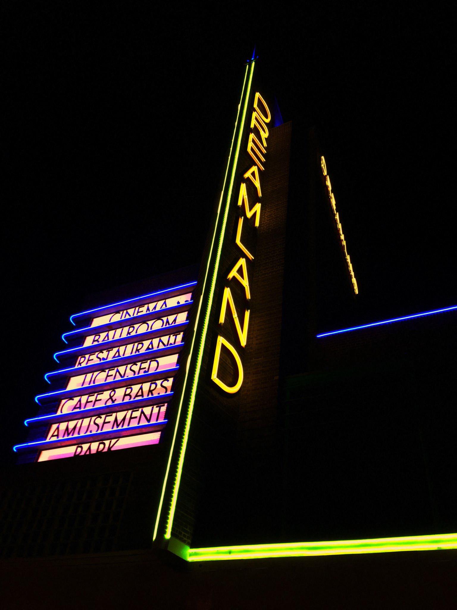 Dreamland Margate sign, lite up in neon and photographed at night