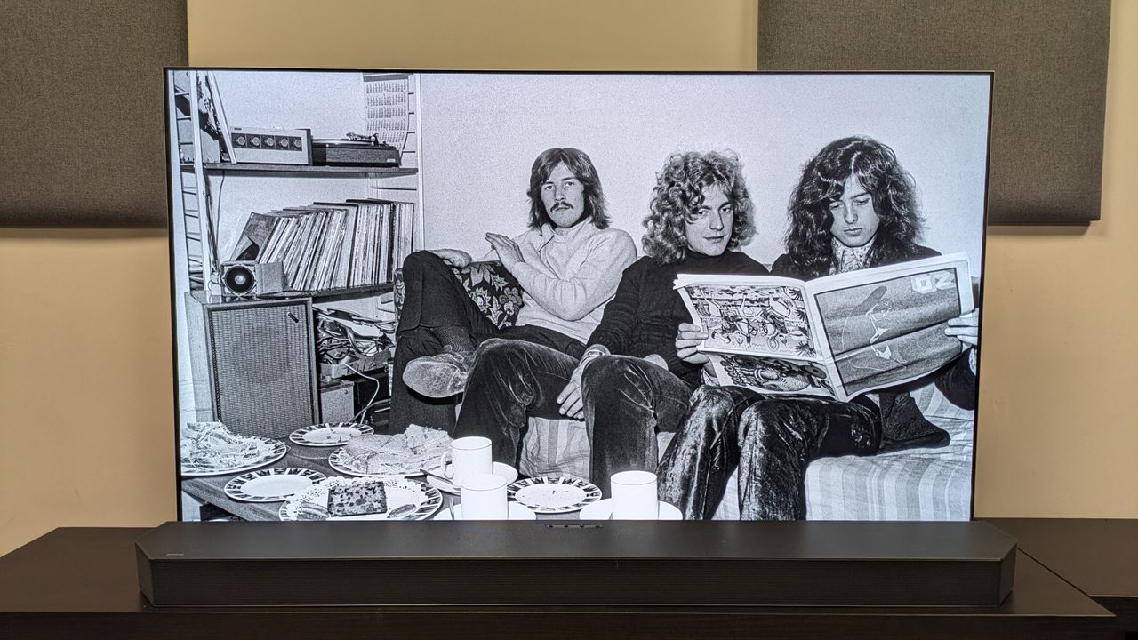 Becoming Led Zeppelin 4K Blu-ray on LG G5 showing Led Zeppelin band photo with Robert Plant, John Bonham and Jimmy Page on a sofa
